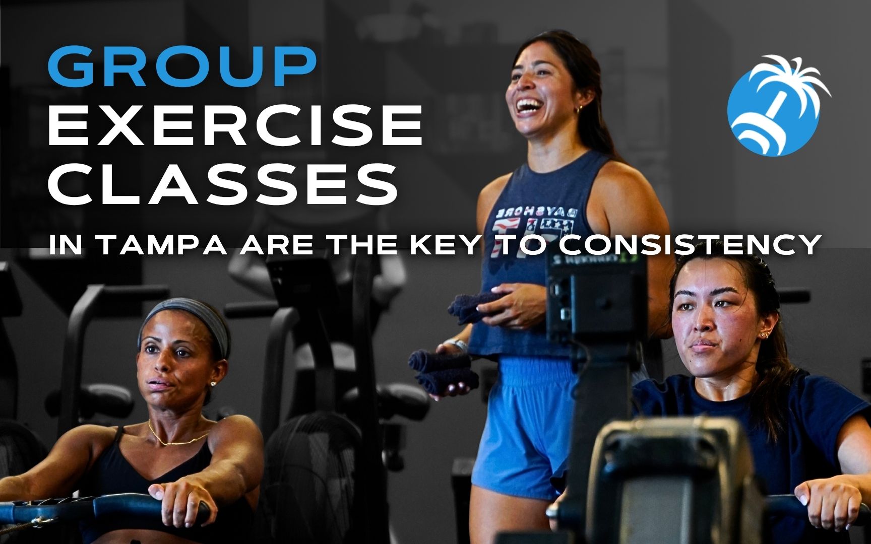 Women participating in a group rowing class at a Tampa gym, highlighting how group exercise classes help build workout consistency